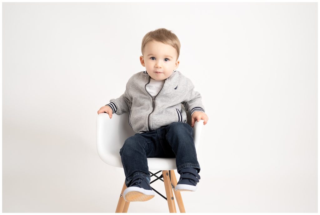 boy in chair on white background