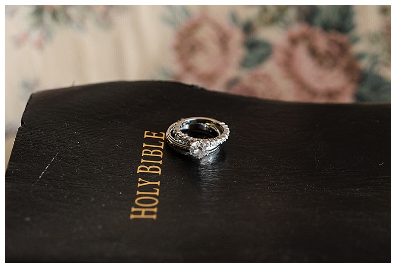 wedding detail photo of bible and rings