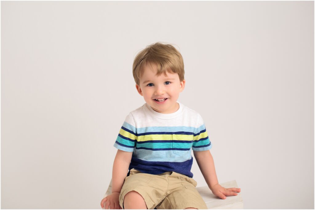 2 year old boy in striped shirt