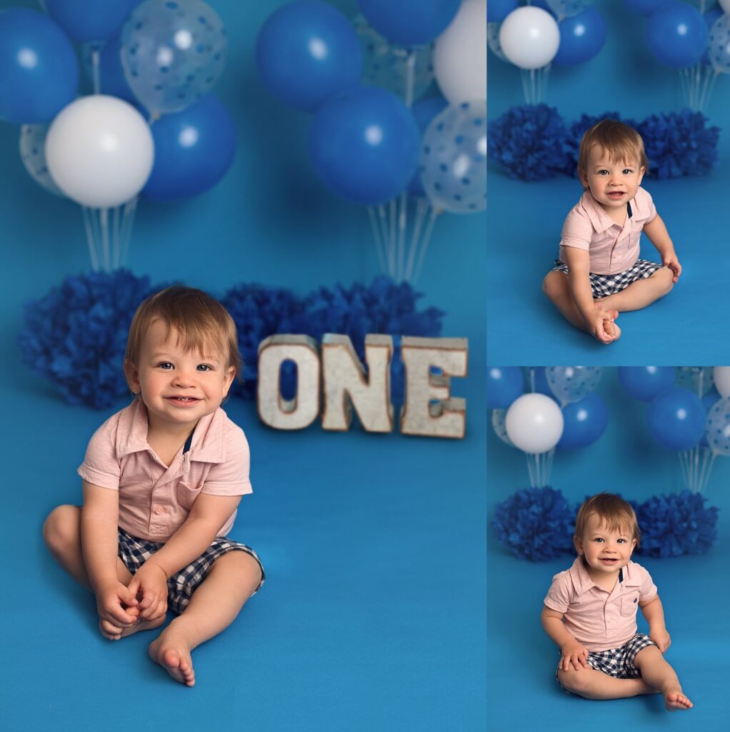 boy on blue background one year photos