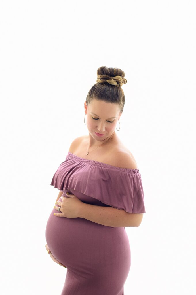pregnant mom in purple dress
